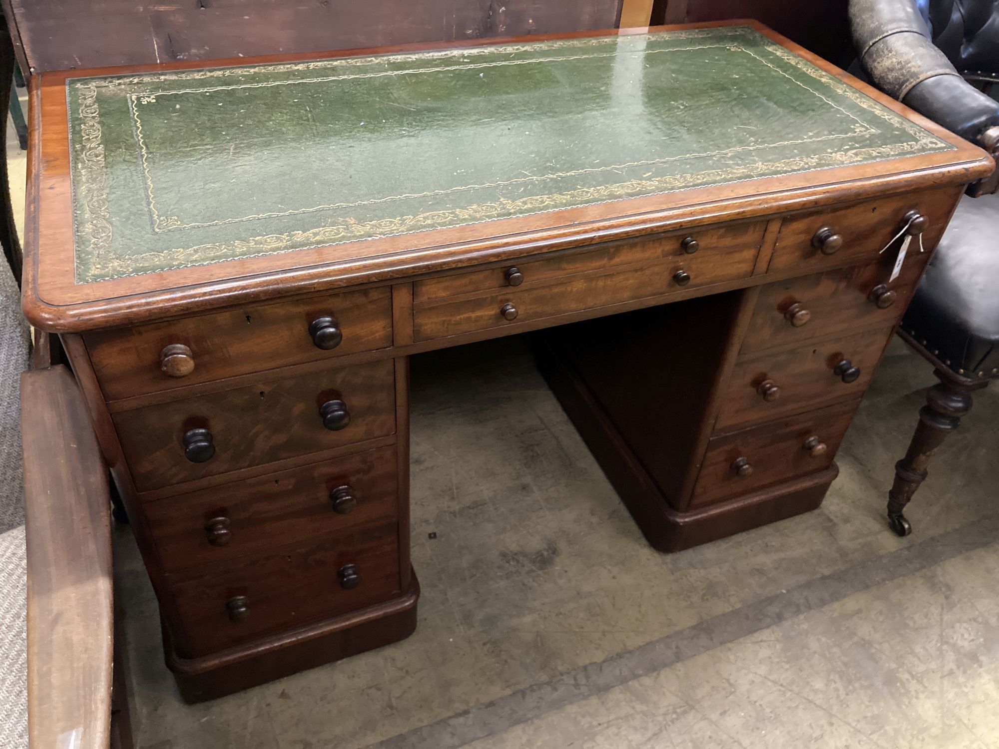 A Victorian mahogany kneehole desk, length 122cm, depth 60cm, height 76cm